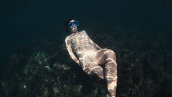 A Naked Buttty Girl Swims In The Ocean But Someone Is Watching Her - hclips.com on poweredporn.com