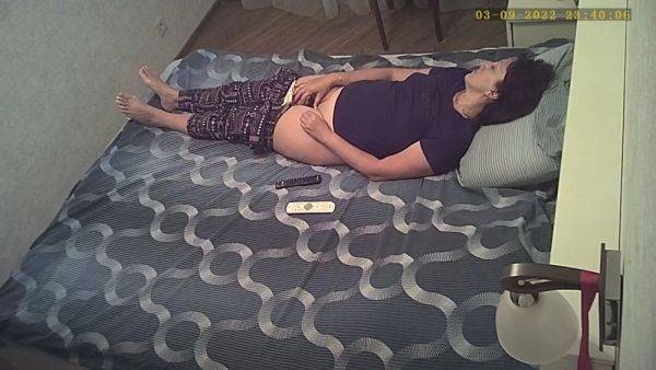 Slightly lowered her panties and jerks off her pussy without knowing about the hidden camera - hclips.com on poweredporn.com