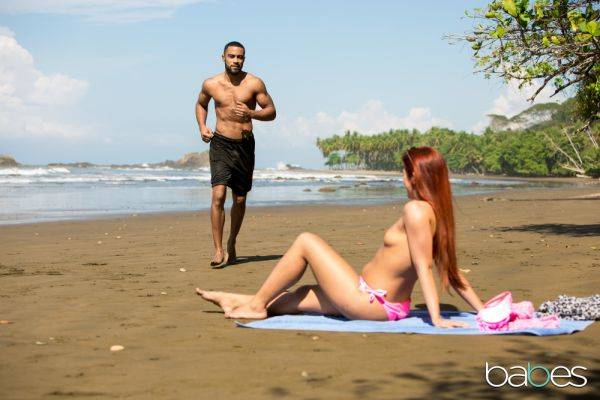 Gala Brown pleasures sporty black dude on the beach - xhand.com on poweredporn.com