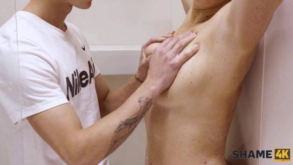 Blonde MILF with juicy butt takes a hot shower before taking a hard pounding in the bathroom - sexu.com - Russia on poweredporn.com