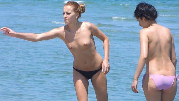 Young nudist cuties caught on camera fooling around outdoors - hclips.com on poweredporn.com