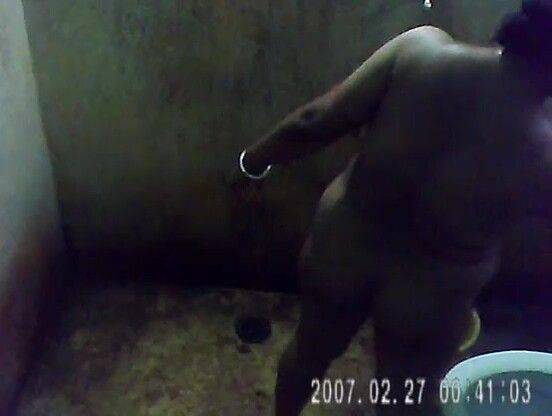 Mature Indian Bengali Bath captured in bathroom by nephew - voyeurhit.com - India on poweredporn.com