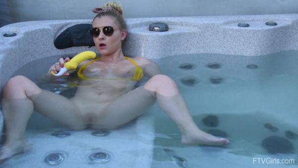 Sweet blonde inserts big dildo in her shaved pussy while in the pool - hellporno.com on poweredporn.com
