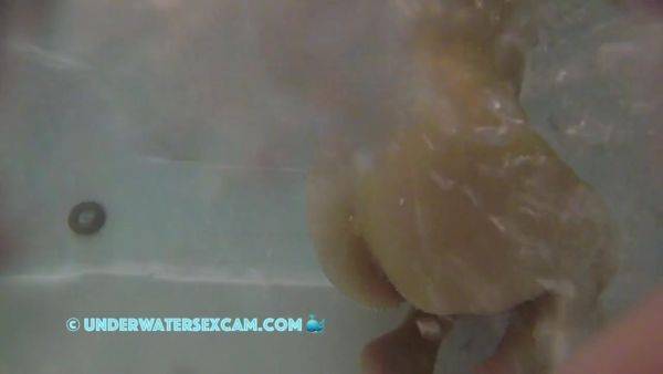 A Few Air Bubbles Find Their Way Up Between The Crack Of Her Ass - hclips.com on poweredporn.com