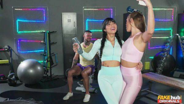 Sporty broads share cock in insane threesome at the gym - xbabe.com on poweredporn.com