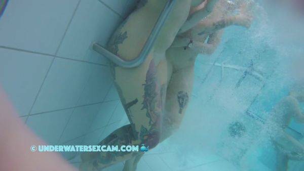 In This Underwater Video We See A Lot Of Piercings And Tattoos - hclips.com on poweredporn.com
