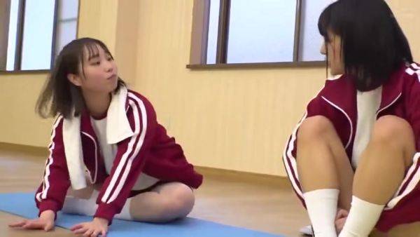 Two beautiful girls in gym clothes lay down a mat and rub and lick the cute breasts of their gymnastics friend - senzuri.tube on poweredporn.com