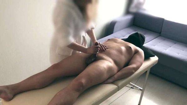 Skilled masseuse Katy provides a soothing back and cock rub, ending in a handjob - veryfreeporn.com on poweredporn.com