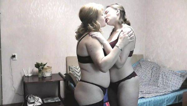 Blonde MILF seduces innocent teen girl with passionate lesbian kissing - veryfreeporn.com on poweredporn.com